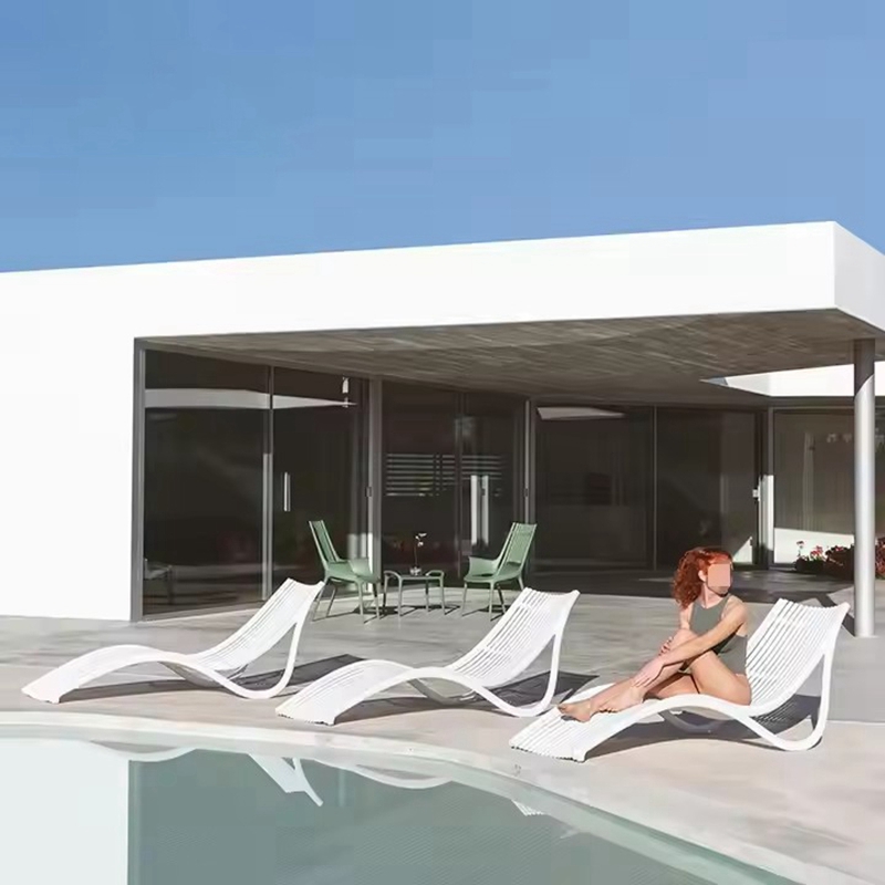 pool lounge chairs in water.jpg